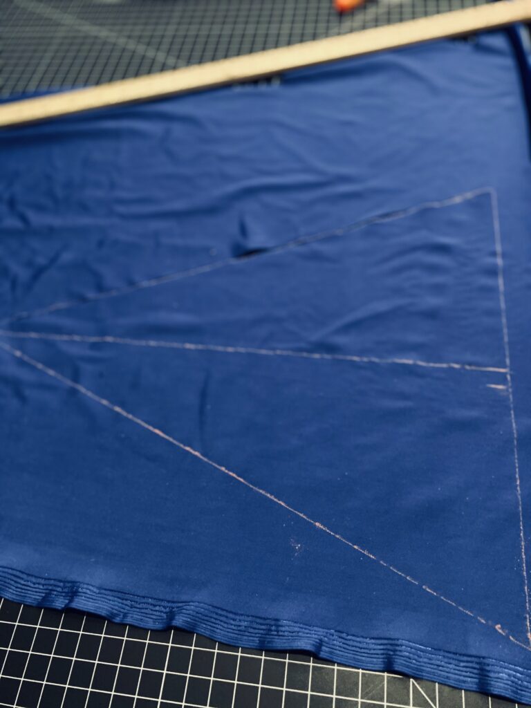 triangle_drawn_on_backing_of_velvet_fabric